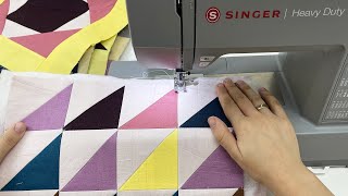 Crafting a stunning patchwork blanket from fabric scraps