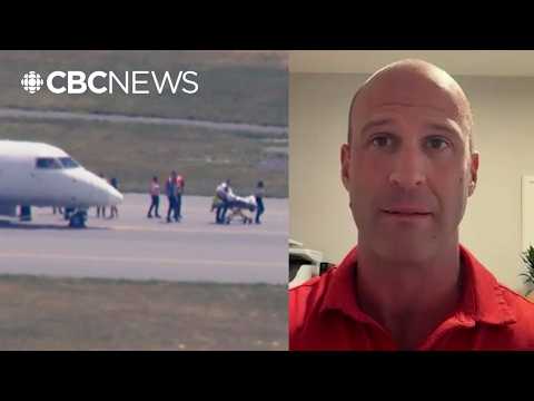Passengers had to restrain pilot, leading to emergency landing