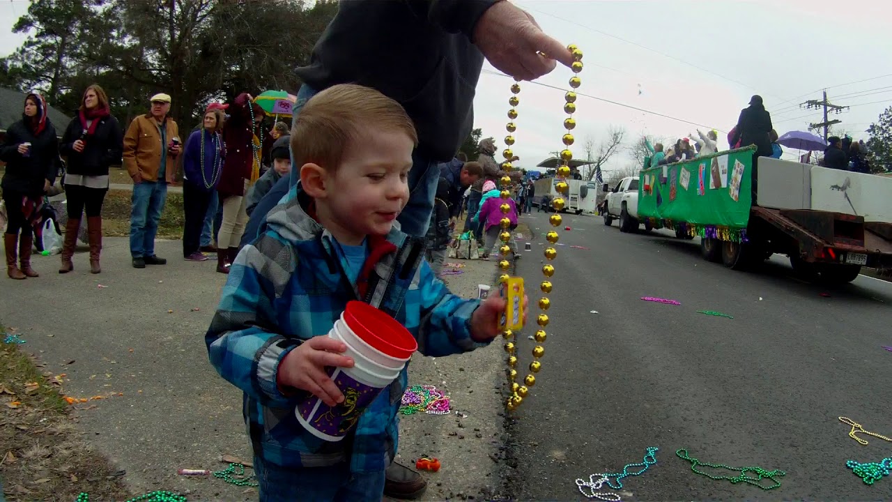 Sawyer catching beads at the Addis Mardi Gras Parade 2018 YouTube
