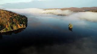 Approach to Nick Stoner Island on Canada Lake through low cloud bank