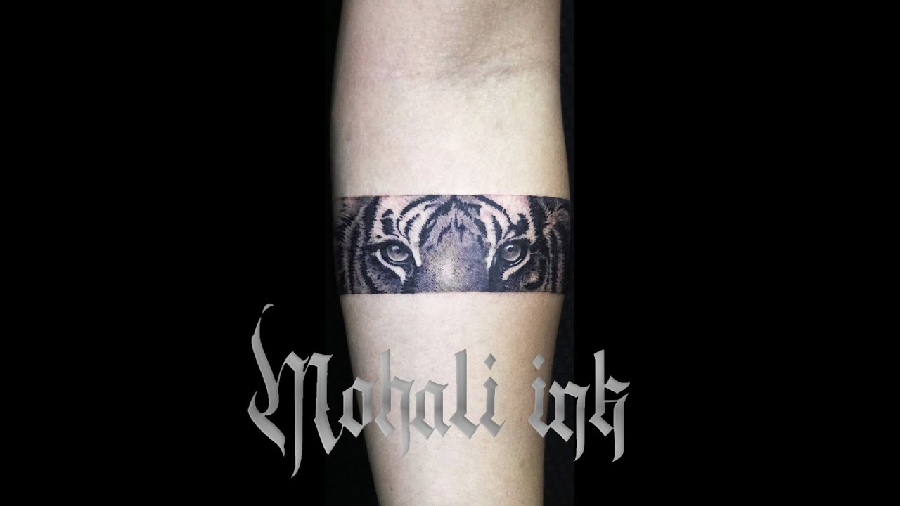 Arm band tattoo with tiger and patterns #armbandtattoo #armbandtattood... |  TikTok