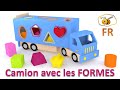 Apprends les formes géometriques en français. Jouets pour bébé: camion trieur de formes