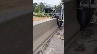 New Jersey Crash Barrier Njcb Laying By Paver....