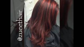 Deep red hair with bright red highlights