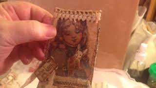 Altered playing cards with pouches...