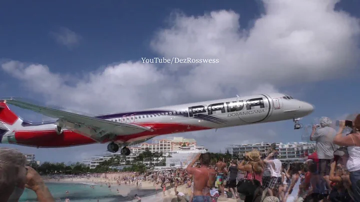 Very low over beach St Maarten landing PAWA MD-80