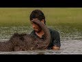 Three-Legged Elephant Bathes with Human Friend | BBC Earth