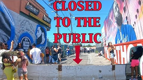 Access denied to NIP$EY murals in alley next to The Marathon Clothing Store