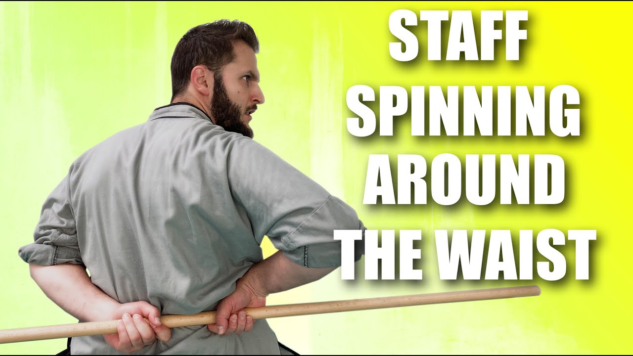 Вращение посоха кунг-фу вокруг талии