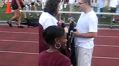 Chris proposes to Staci at a football game