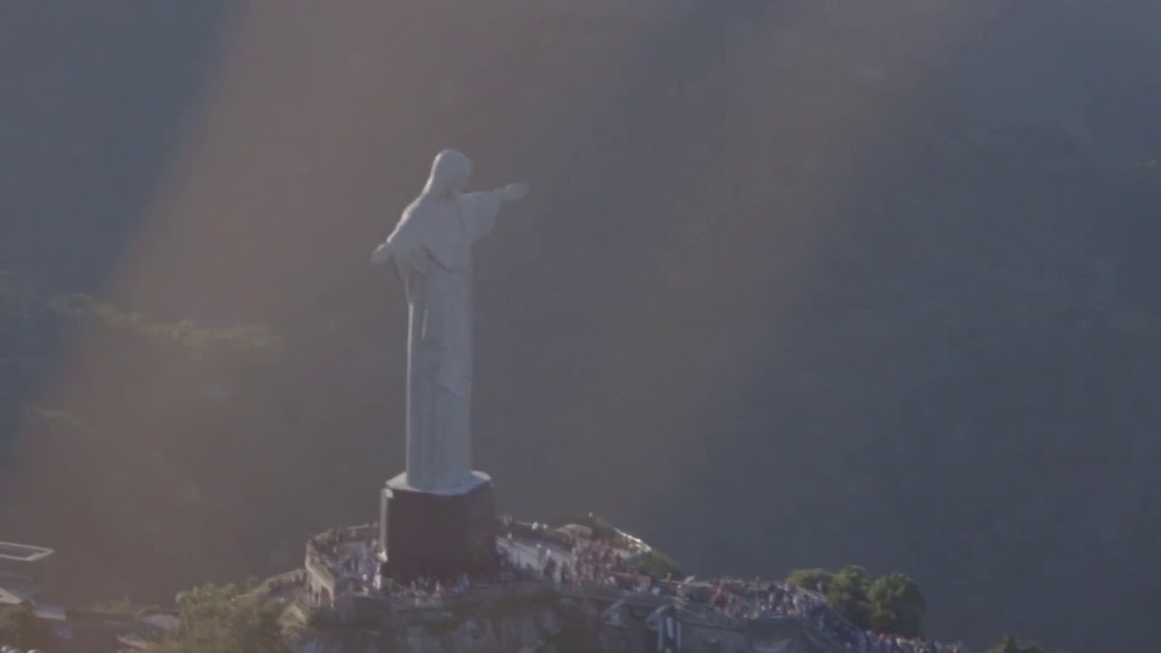 Statue on top of a mountain YouTube