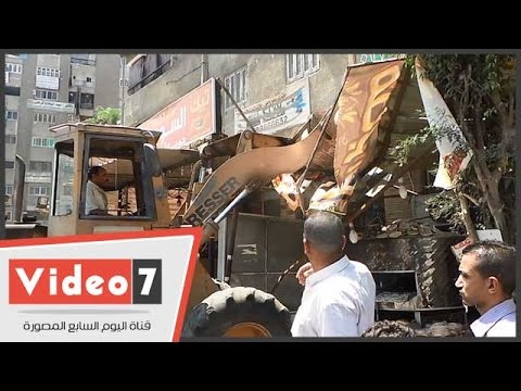 بالفيديو حى الطالبية يزيل واجهات المحال المخالفة بالبلدوزر والعمال بداخلها