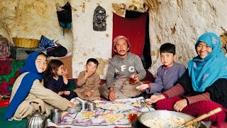 The Afghan parents | cooking Rice with Raisins( کشمش پلو) for their twin Kids inside an ancient Cave