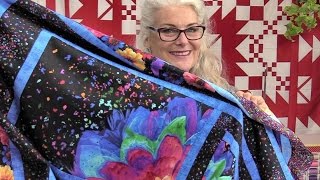 Easy Quilt with a Large Floral Panel One large flower panel cut into 4 with simple borders makes a beautiful Radiant Quilt. And it sewveryeasy to do:) Fabric by Timeless