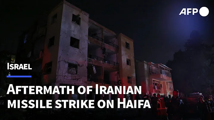 Aftermath of Iranian missile strike in northern Israeli city of Haifa | AFP