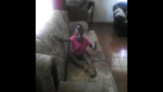 Baby Girl Jumping On Sofa