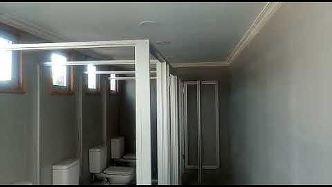 Ablution unit made from shipping containers