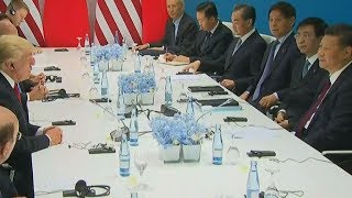 G-20 leaders end summit with statement noting the US climate change stance