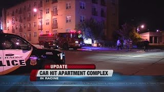 Car hits apartment complex in Racine