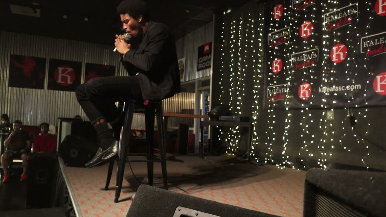 Juan kicks it at the Kaleafa Social Club...