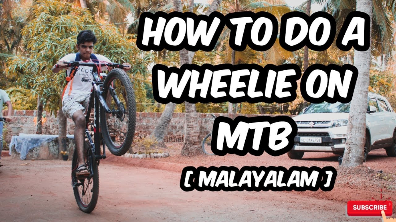 HOW TO DO A WHEELIE ON A MTB [MALAYALAM].