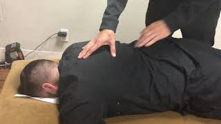 Dallas Chiropractor Getting Adjusted
