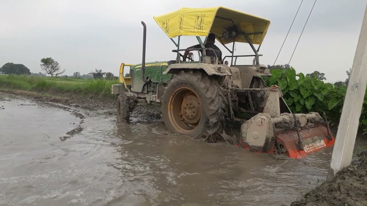 John Deere 5036D Tractor in mud YouTube