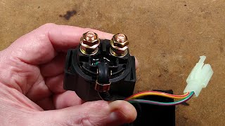 Inside a cheap quad/scooter starter relay solenoid