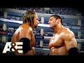 Batista BETRAYS Triple H Leading to EPIC Rivalry | WWE Rivals | A&E