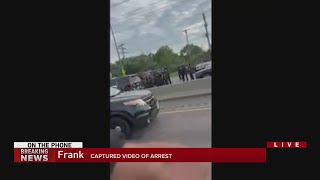 Video taken by driver passing by arrest of Highland Park suspect