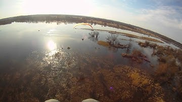 paramotor funn with foot drag on the water