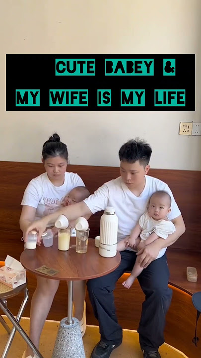 A couple went out with their baby in one hand and finished making milk in 15 seconds #DadWithBaby