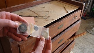 The surprising restoration of the ancient chest of drawers (A fragment of a Roman coin found)