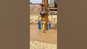 The image shows a Sumitomo excavator equipped with a rotary cutter head dredging or desilting p