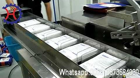 How to pack mask into box,KN95 mask packing machine,cartoning machine