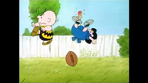 Charlie Brown kicks the shit out of Lucy's hand