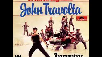 John Travolta, Jeff Conaway - Greased Lightnin' (Grease). John Travolta, Jeff Conaway - Greased Lightnin' (Grease).