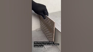 video showing a manual "scribing" technique to mark a tile cut without using a measuring tape
