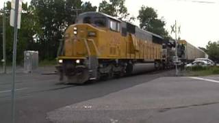 VERY RARE; UP SD60M 3 window with meet of CSX Trash 4 units