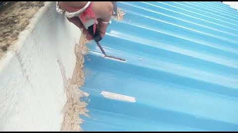 Installation of solar mini rails on sheet roof using adhesive