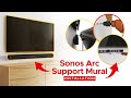 Fixez votre support mural Soundbass Sonos Arc Soundbar au mur et attachez la barre de son.