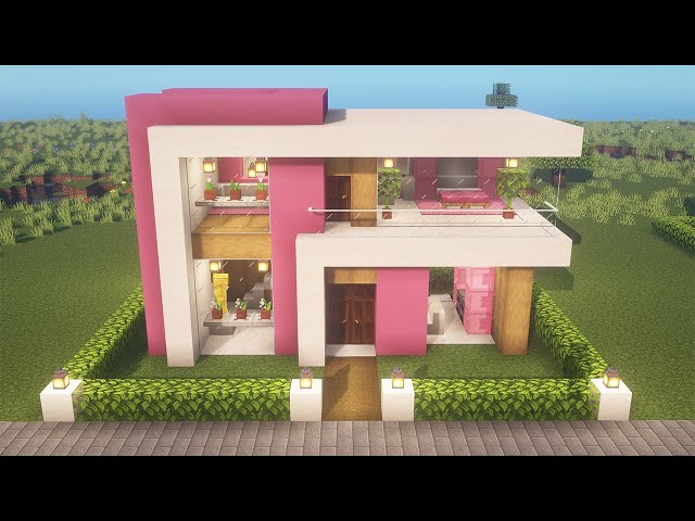 Impressive minecraft house with a brunette girl standing beside