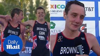 Moment Alistair helps brother Jonny over line in World Triathlon - Daily Mail