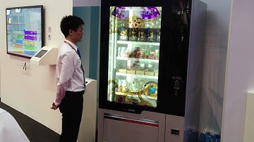 AUO 50" transparent display with Tropox vending machine in CODE 2012 Shenzhen