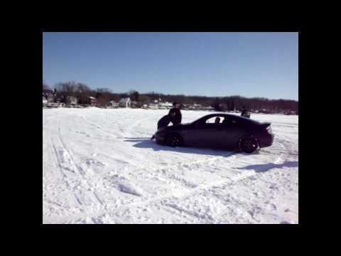 So I deleted the main part of this video on accident. But I was in Wisconsin and drove my car on a lake again.. well I forgot it snow the night before and I drove my little Tiburon on the lake and got stuck.. I got lucky cause a few guys on snowmobiles helped my dad push me out.. Just me being me.