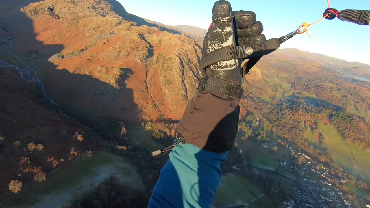 Flying over clouds. Paragliding, Lake District, Conistion old man