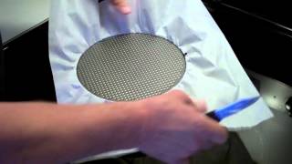 Easy way to line the bottom of a spring form pan with parchment paper!