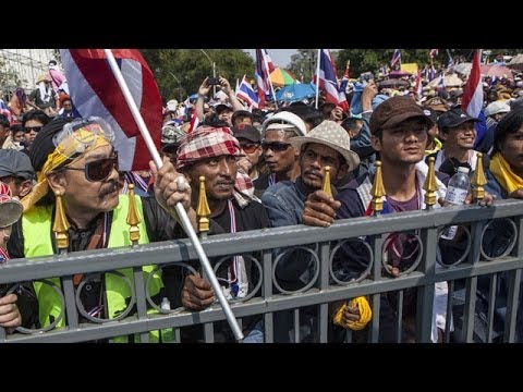 Thailand's prime minister dissolves parliament but street unrest continues Instructional Video