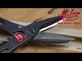 Cutting vinyl siding with malco products using a sider tool and andy snips