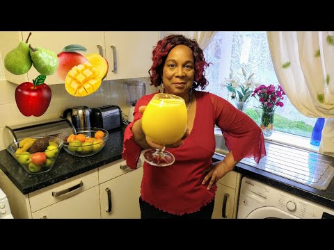 Come fare in casa naturale Mango, Mela, pera e succo con un pizzico di zenzero